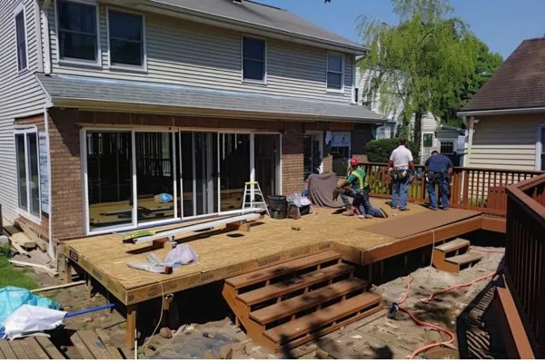 deck contractor working on an expansion