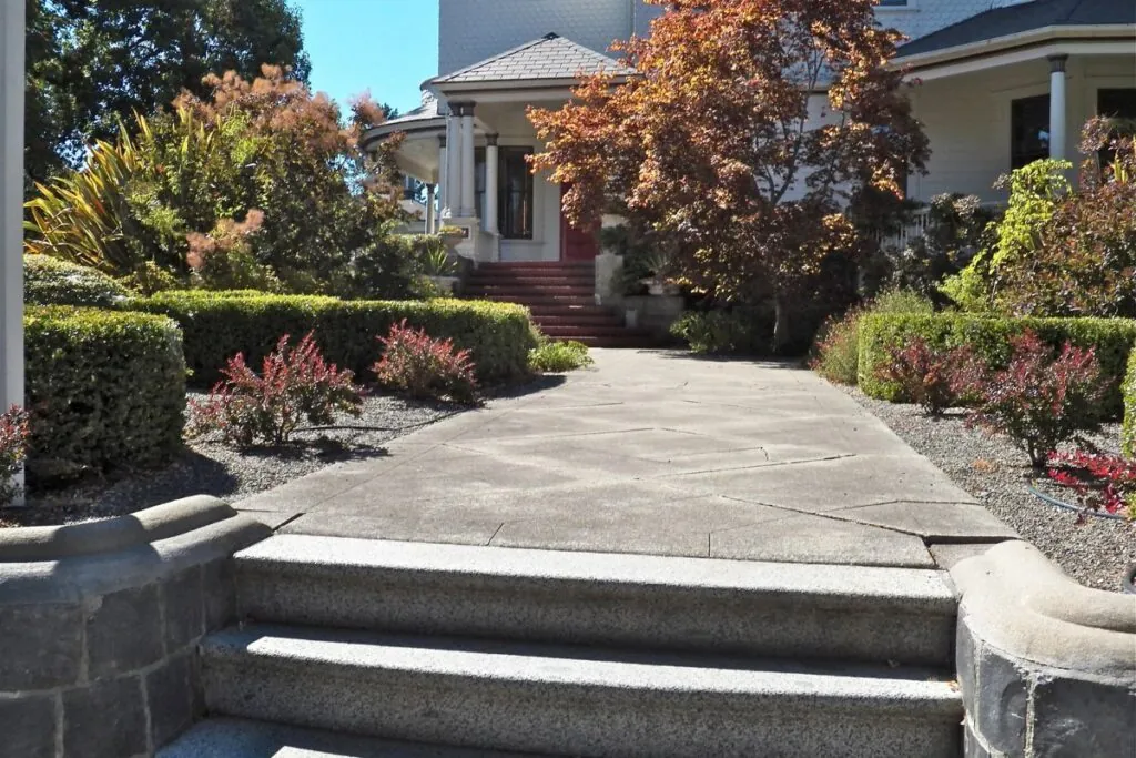 walkways and pathways constructed with elegant gravel and flagstone surrounded by beautiful landscaping under the clear blue sky in lower township nj